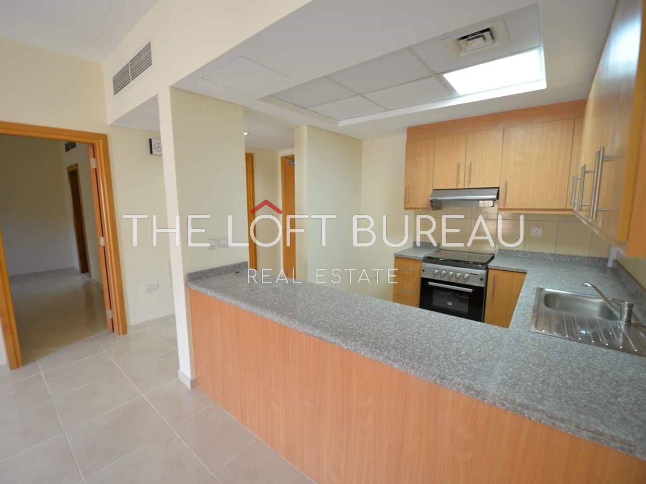 Super neat unfurnished 1-BD | Ready Title Deed